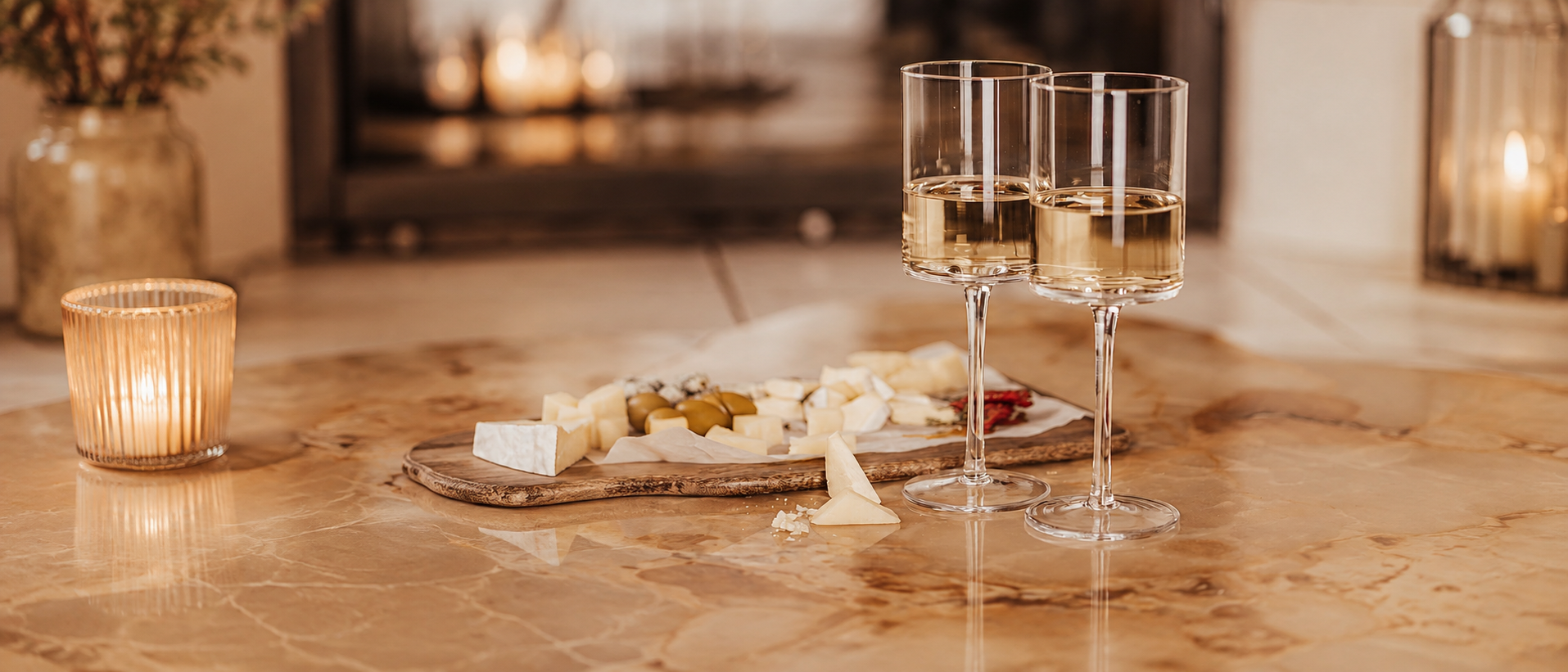 Elegant glassware arranged on a warm dining table